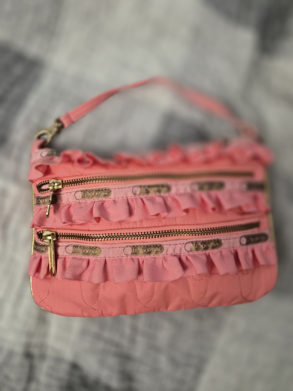 NWOT Lesportsac Pink Ruffle Zip Wristlet